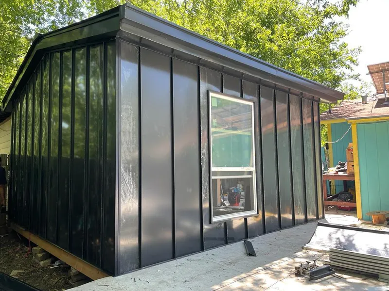 Black standing seam metal wall panels for Metal Roof Installation in Weston